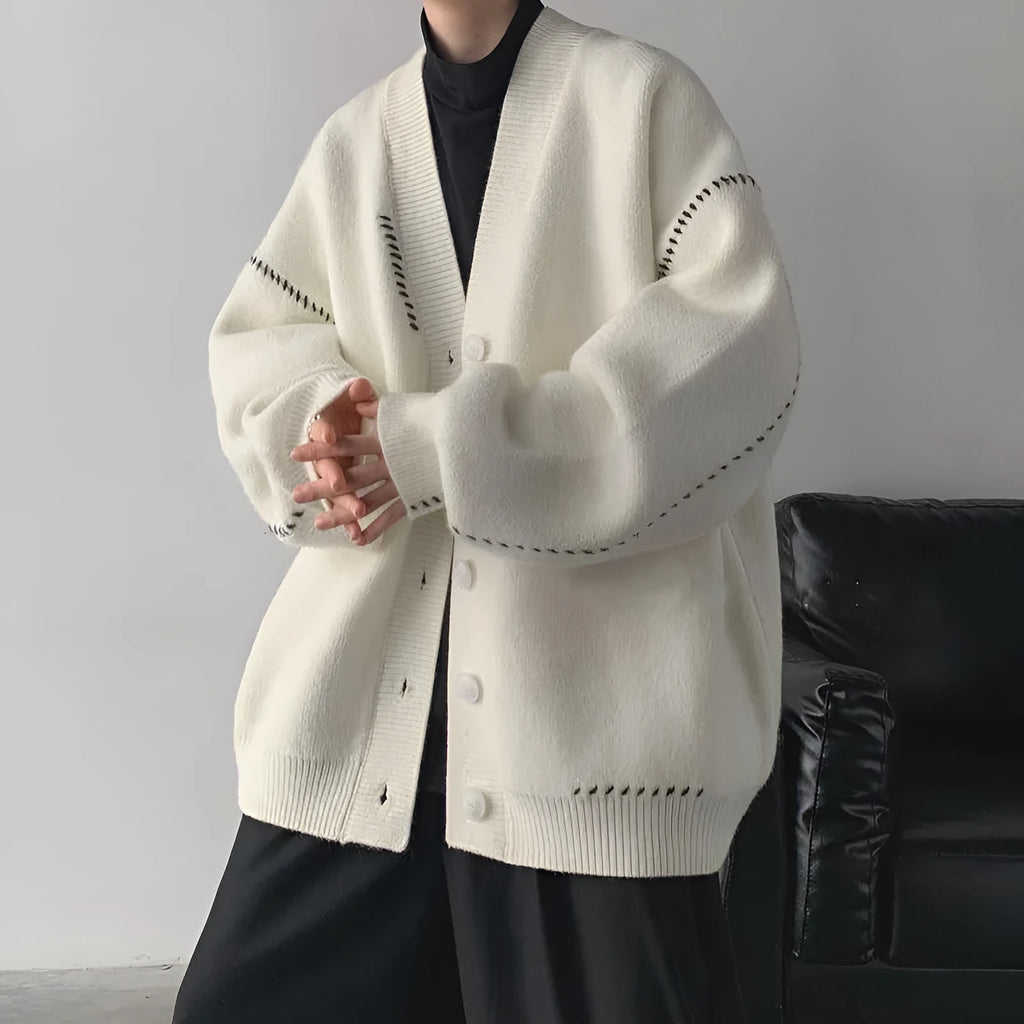 Women's loose fit knitted cardigan coat in black polyester fabric with long sleeves