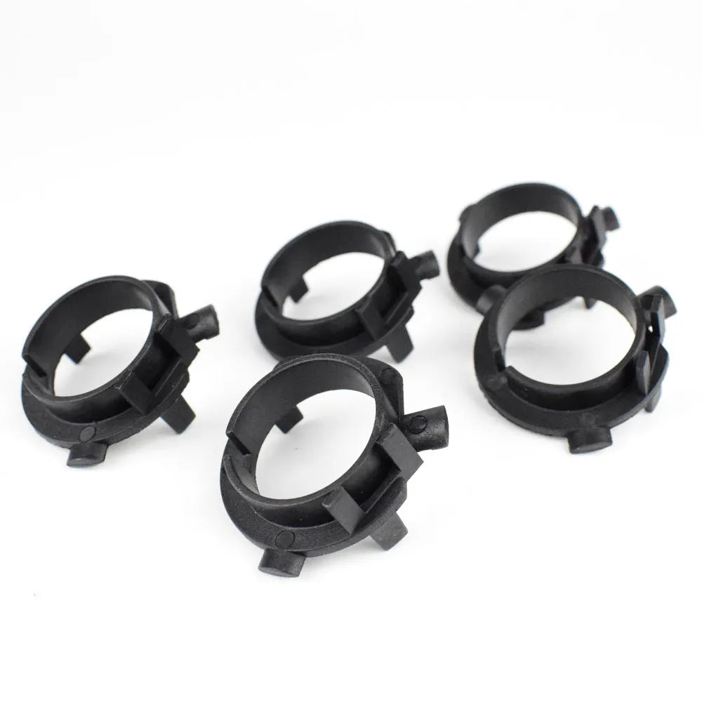 Black ABS plastic car LED headlight card holder for compatible vehicle models.