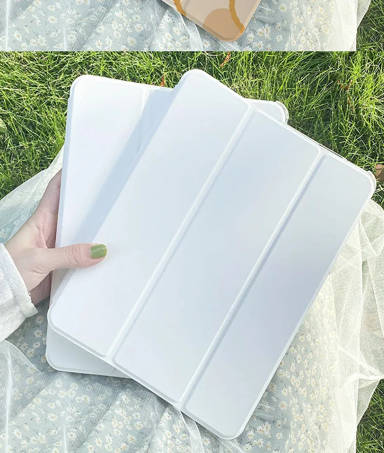 A flat, tri-fold silicone protective case for an iPad, shown in a cartoon rabbit pattern.