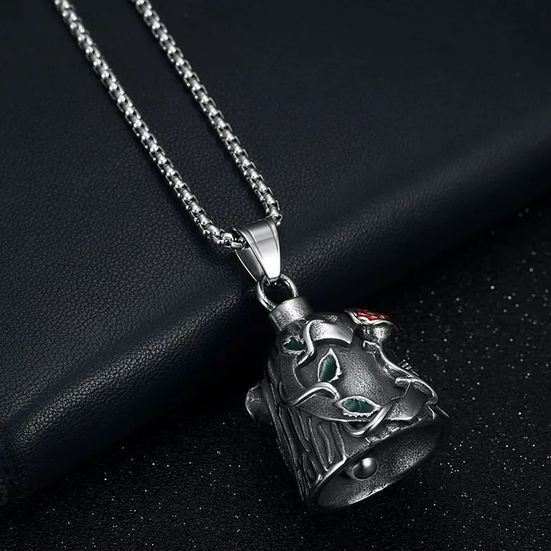 Titanium steel motorcycle lucky bell with vintage polished finish showing double-sided epoxy rose design
