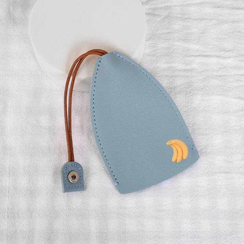 Colourful cartoon pull-out key case made from PU leather showing design options