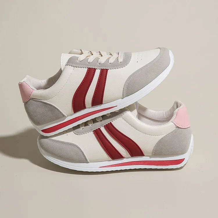 Red and blue low-top lace-up leisure sneakers with PU mesh upper and rubber sole.