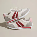 Red and blue low-top lace-up leisure sneakers with PU mesh upper and rubber sole.