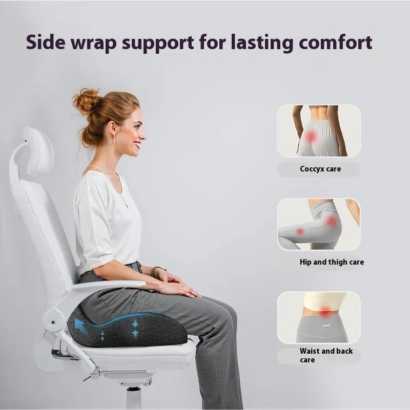 Grey memory foam office chair cushion on a desk chair