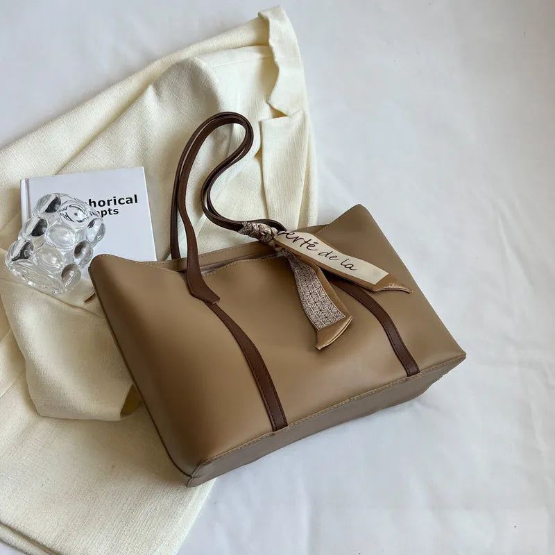 Casual tote bag with bucket fashion design in available colour combinations showing shoulder and crossbody carry options