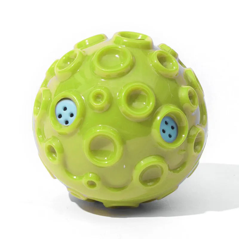 Colourful rubber dog toy ball with textured surface for chewing and teeth cleaning