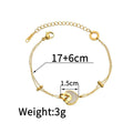 Women's stainless steel bracelet with a double-layered red heart resin charm.