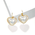 Gold-coloured alloy ear clips for women with natural style and clip-on design