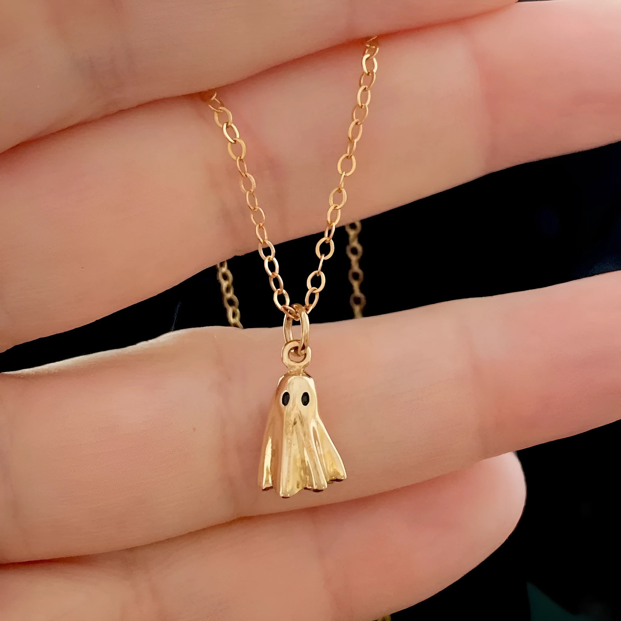 Ghost pendant necklace with titanium steel ghost charm on a stainless steel chain.