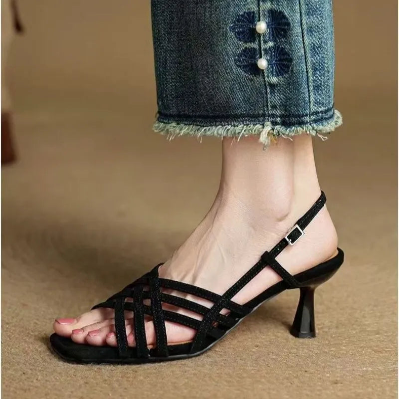 Retro-style women's ankle buckle high heel sandals with square toe and mid heel, shown in a neutral colour.