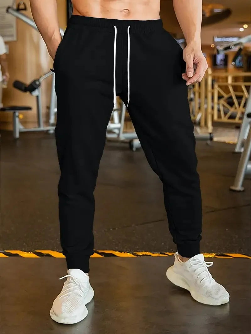 Men's linen style leisure trousers with elastic drawstring waist in loose fit cut