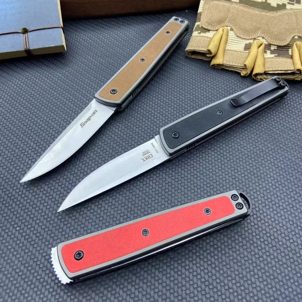 Folding fruit knife with stainless steel blade shown unfolded displaying 7cm blade length and 10cm handle