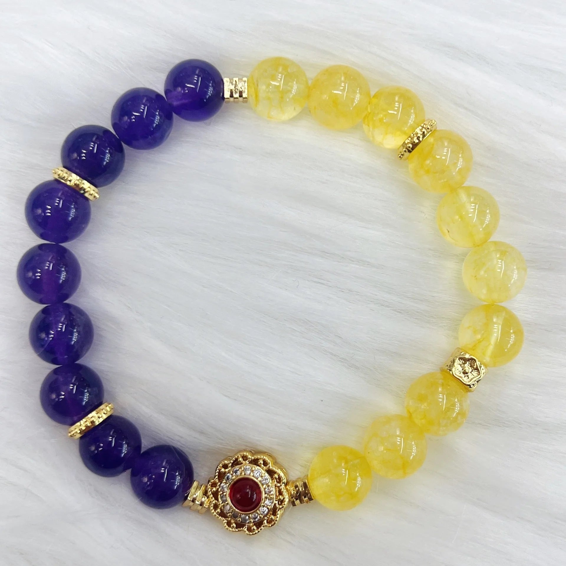 Handmade women's amethyst crystal bracelet with yellow and purple beads