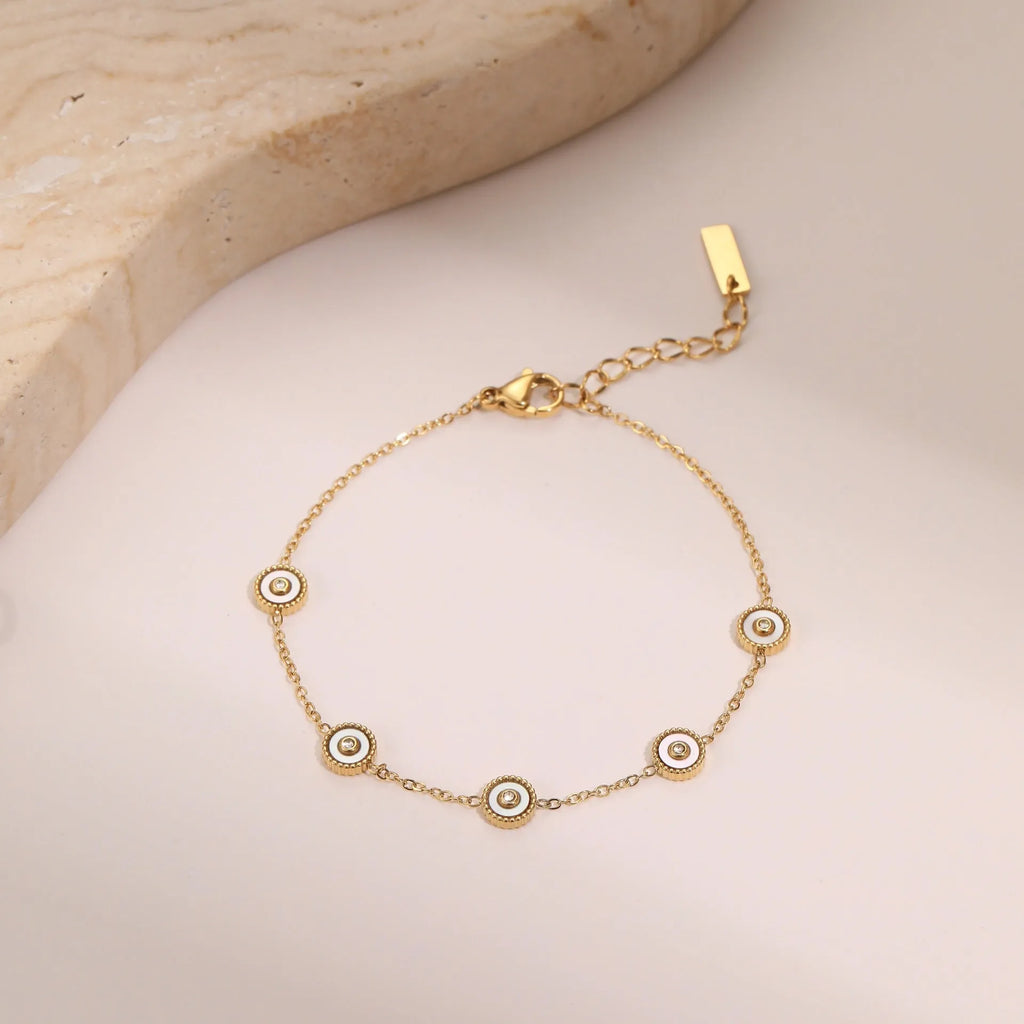 Geometric design women's jewellery set with bracelet and necklace in gold-plated stainless steel