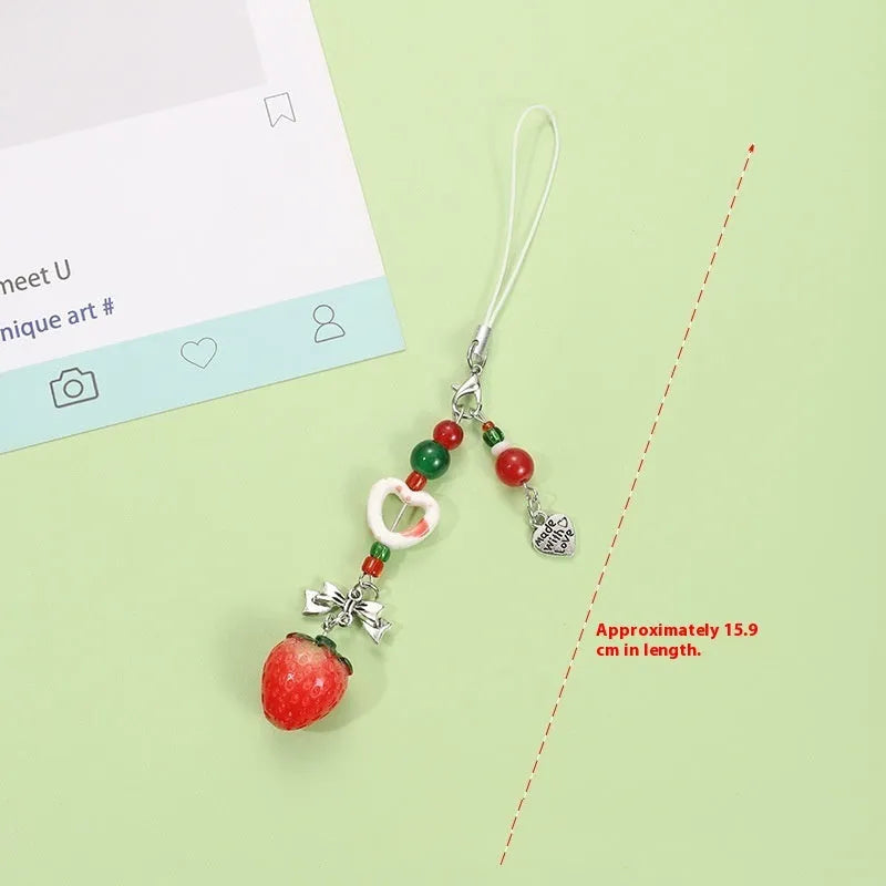 Fruit pattern mobile phone charm keychain with apple and strawberry designs in plastic resin material