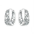 Retro hollow butterfly earrings in sterling silver with zircon accents, measuring 14mm by 5mm