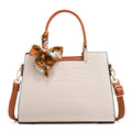 Milky white women's PU leather shoulder handbag with interior organisation pockets in horizontal square shape.