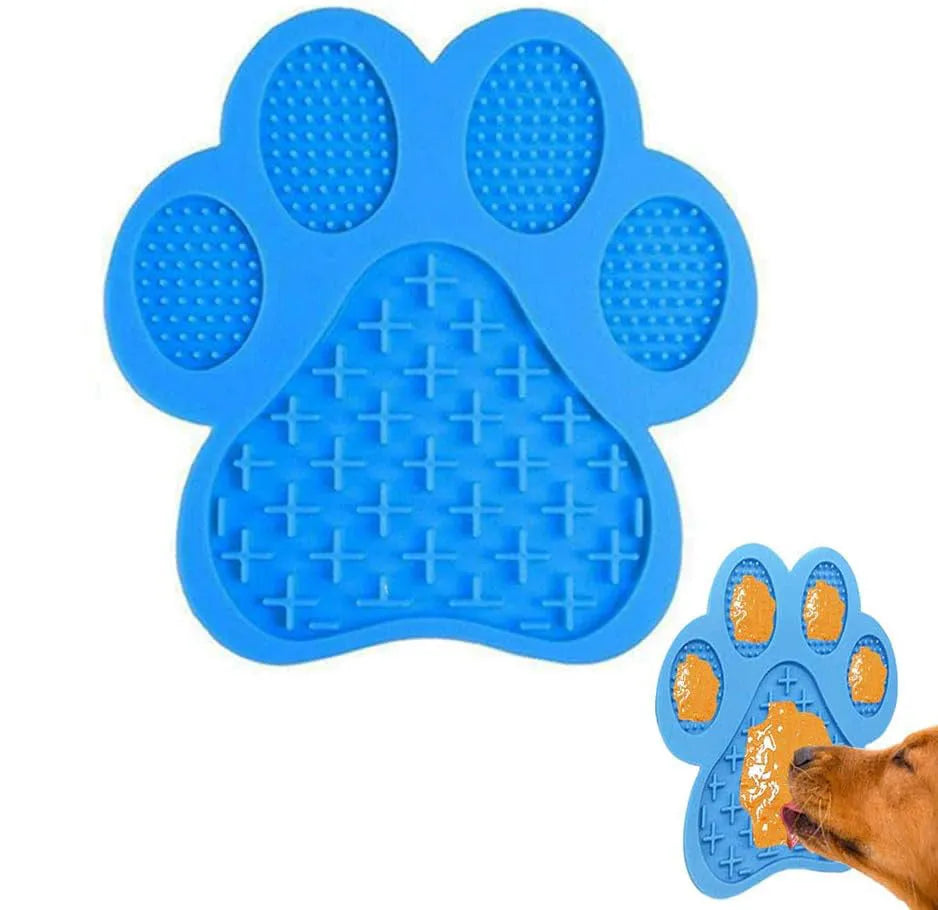 Blue bone-shaped silicone dog licking mat with suction cups on the back for sticking to smooth surfaces.