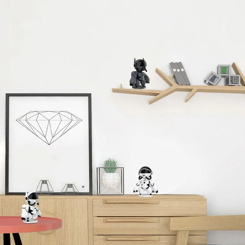 White wireless security camera with detachable base on a table for home monitoring.