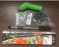 Cordless electric lawn trimmer with extension pole and black debris shield on a green lawn.