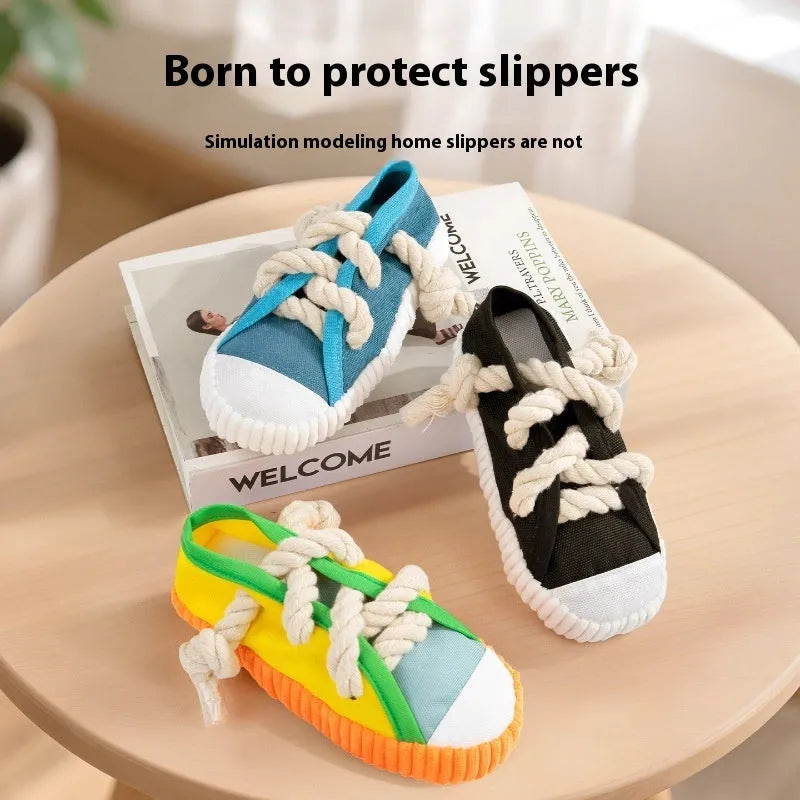 Plastic dog chew toy with sound squeaker in bendable slipper design for dental care