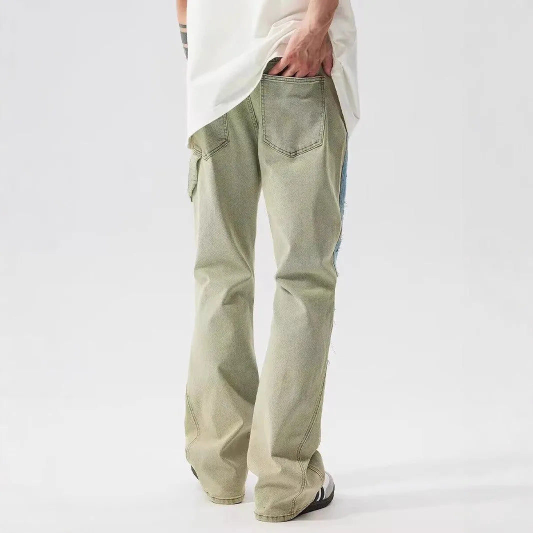 Retro yellow and blue patchwork jeans with splash-ink distressing, mid-waist cut with zip fly