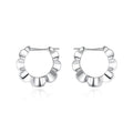Geometric sterling silver earrings with round elements and retro styling