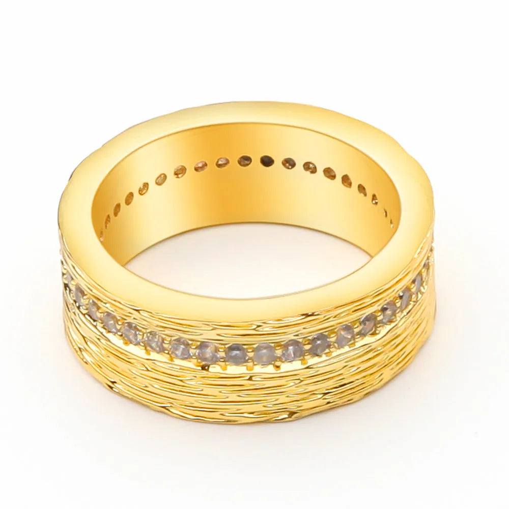 Gold-coloured geometric women's ring with zircon stone, shown from multiple angles
