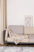 Blue cartoon dog pattern on a thick flannel pet blanket laid flat, showing its size as a dog kennel mat.
