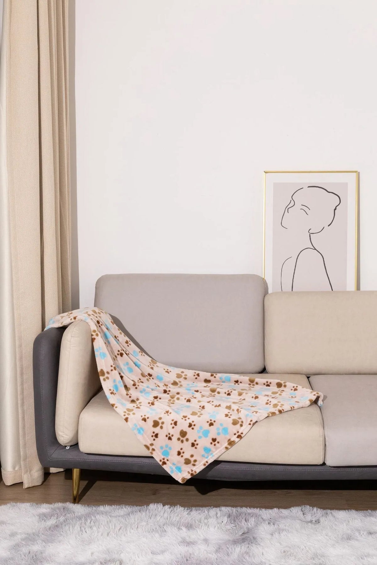 Blue cartoon dog pattern on a thick flannel pet blanket laid flat, showing its size as a dog kennel mat.