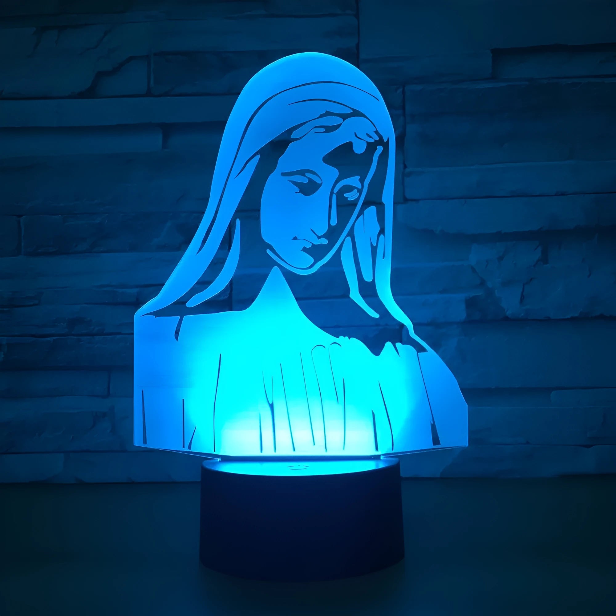 3D LED night light showing dual-ring light pattern from acrylic plate, with ABS base and touch/remote control.