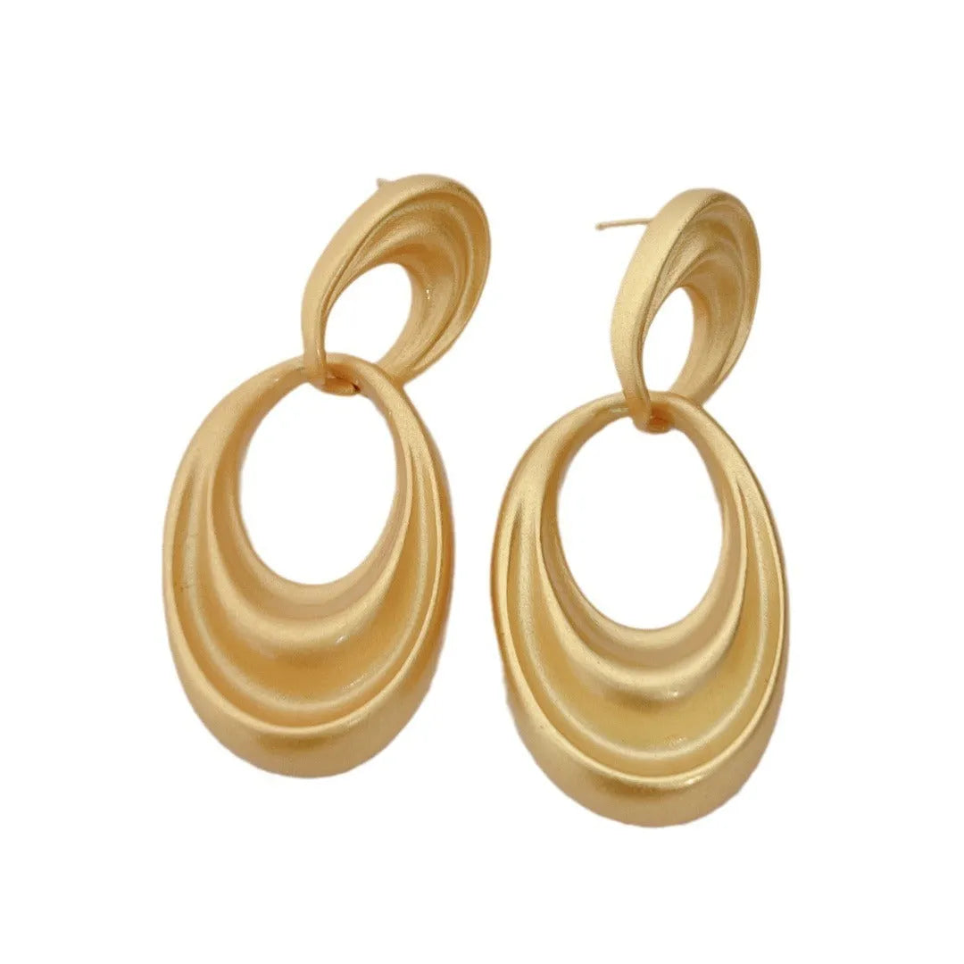 French retro gold double circle earrings with U-shaped design in quicksand colour