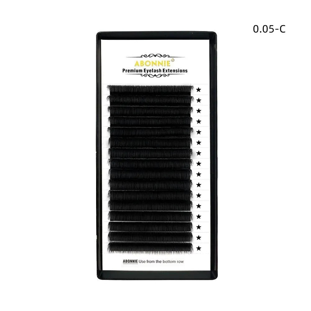 Pack of false eyelashes showing dense 16-row mink hair lashes on a clear band.