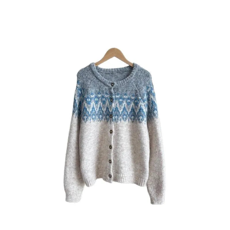 Women's loose-fit jacquard knit sweater coat in milky white, shown with long sleeves and textured pattern.