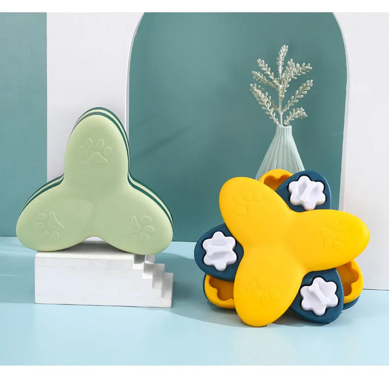 Green and yellow dog puzzle toy with bone-shaped covers and non-slip base.