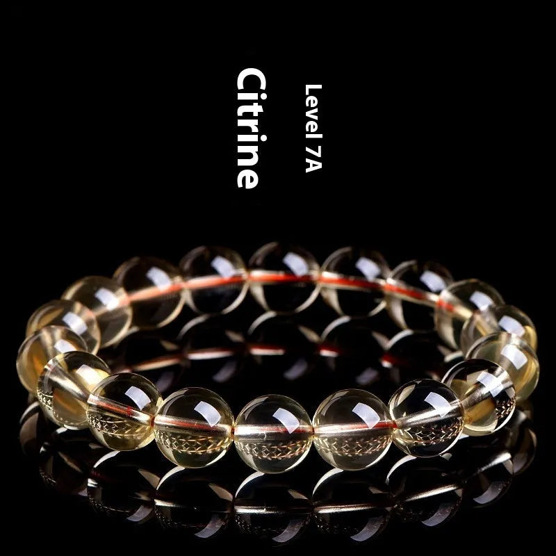 Natural citrine scattered beads ball bracelet showing 7A and 6A colour grade options on a wrist.