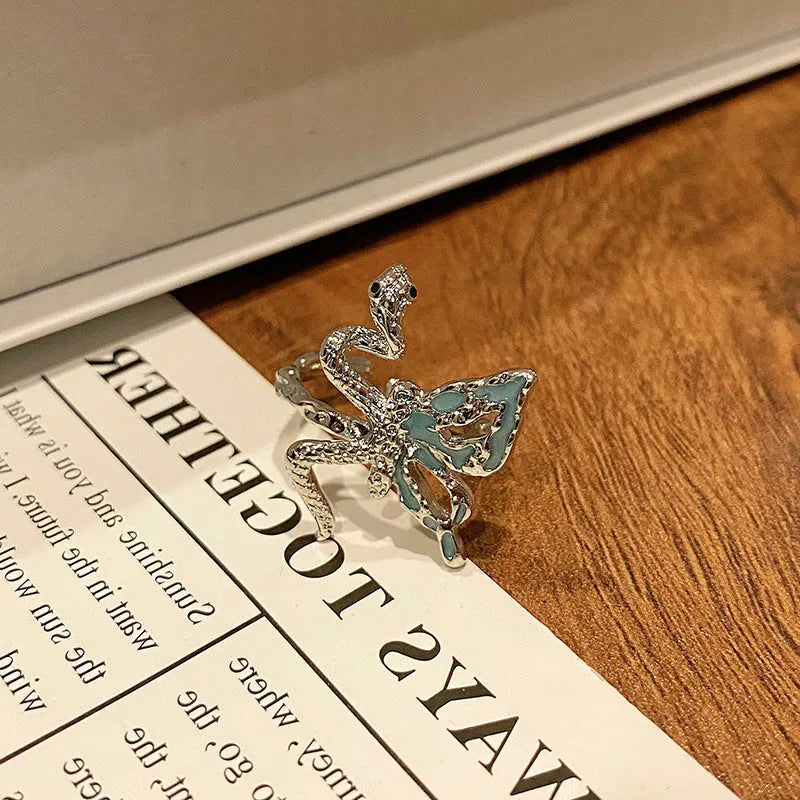 Butterfly women's copper ring with adjustable split ring design showing oil-drip colour treatment
