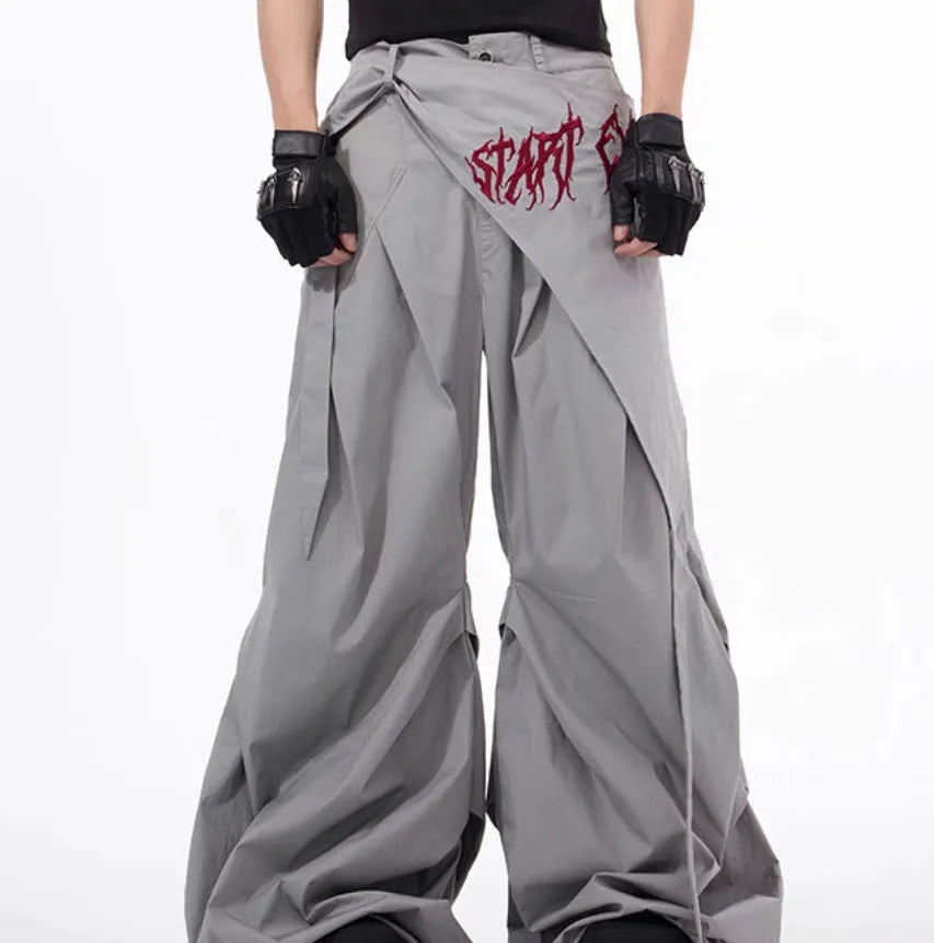 Boy modelling black wide-leg Korean-style casual trousers.
