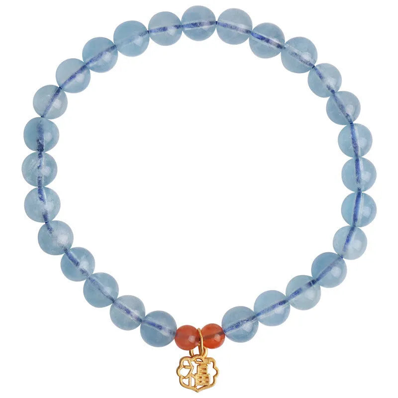 Natural aquamarine crystal blessing card bracelet with icy translucent 8mm round beads and sequin accents.