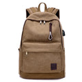 Canvas backpack with USB charging port and shoulder straps in khaki colour.