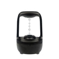 Black and white anti-gravity humidifier with floating water drops and large 500ml water tank.