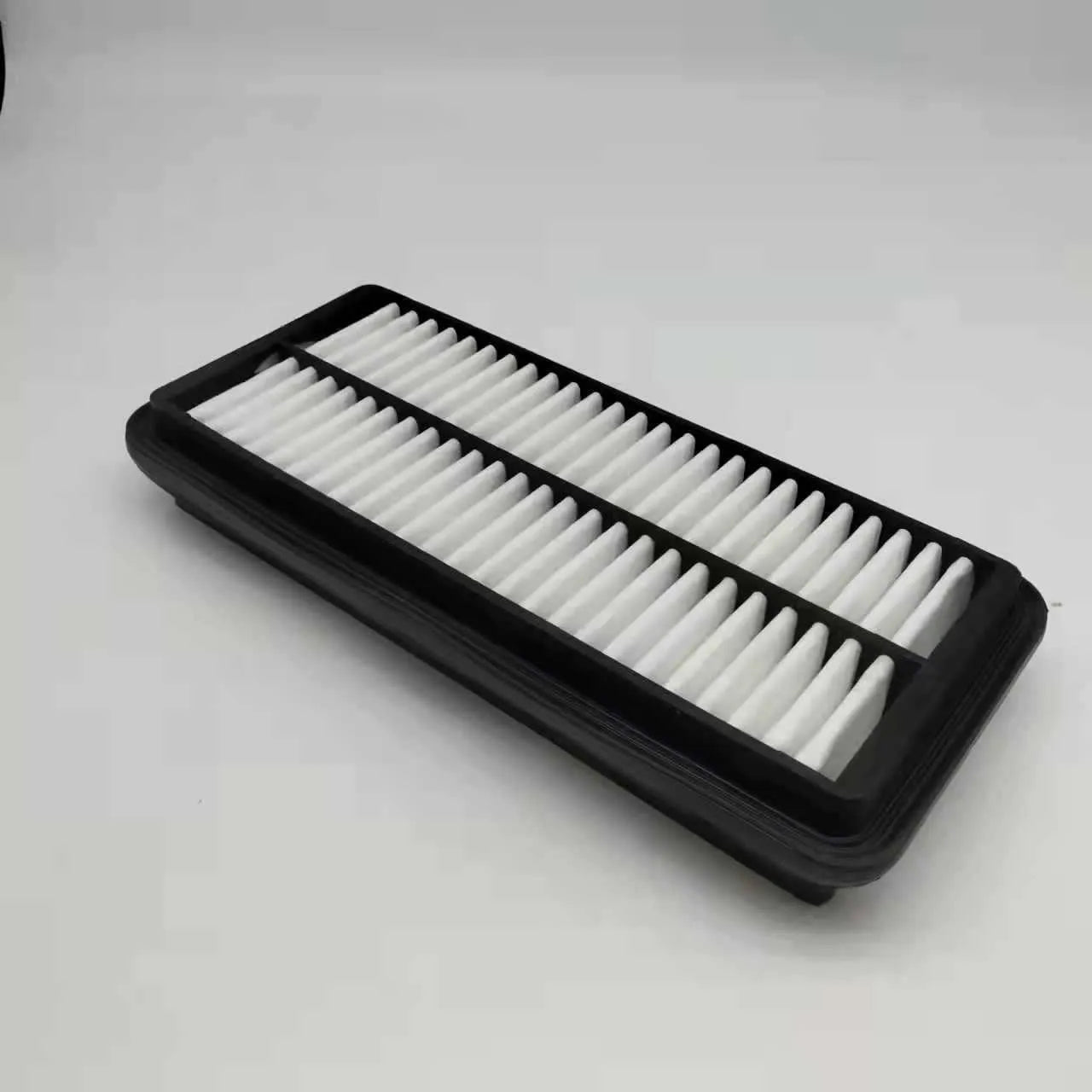 Black car air filter replacement part measuring 256mm by 113mm by 40mm for Modern vehicles