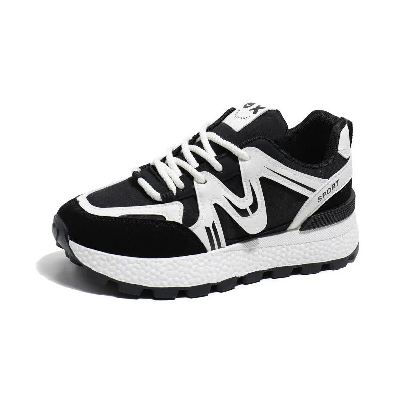 Women's black platform casual lace-up trainers with a round toe and flat heel on a white background.