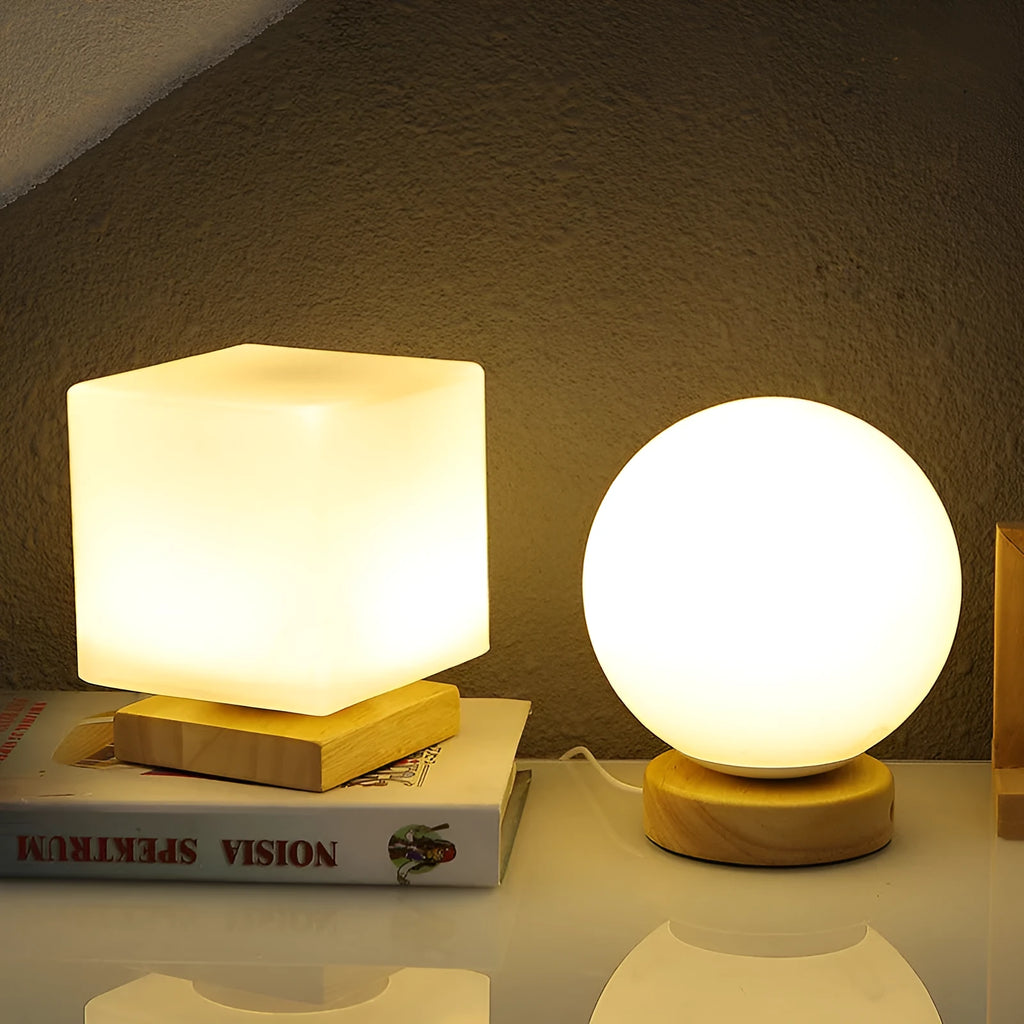 Nordic solid wood USB table lamp with touch dimming in white cube style on wooden surface