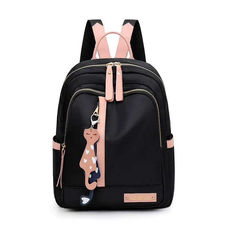 Women's black casual nylon backpack with multiple pockets and soft shoulder straps