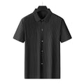 Plus size man wearing a black striped ice silk shirt with a square collar and loose fit.