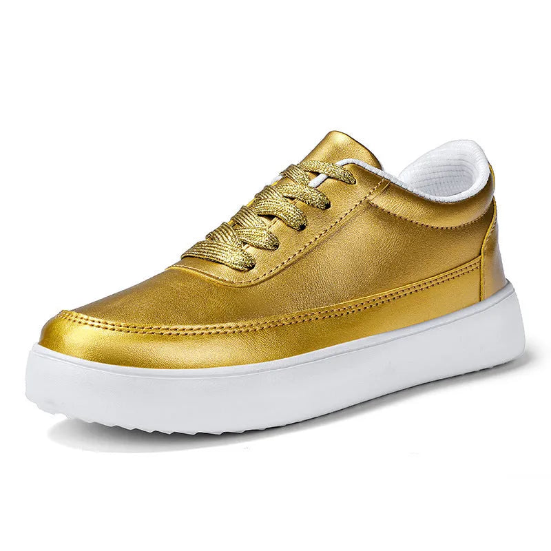 Women's white leather lace-up flat casual shoes on a neutral background.