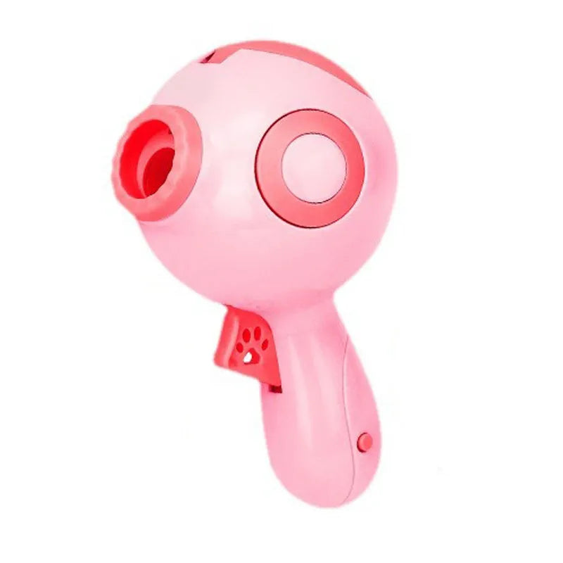 Green, orange or pink dog treat launcher toy for interactive feeding and training