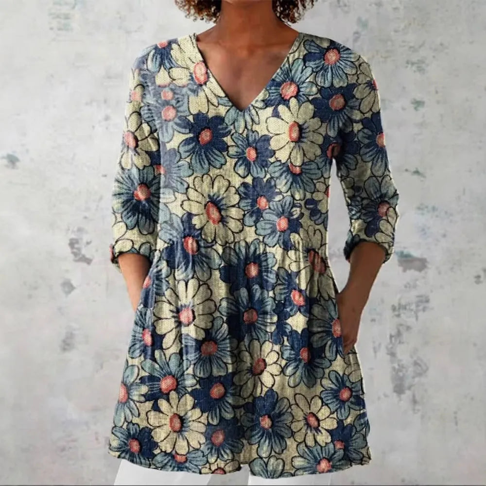 Women's retro style slim fit long sleeved top with a digital printed pattern.