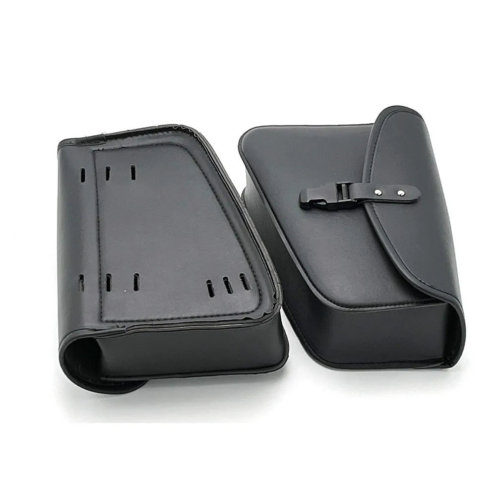 Black PU leather motorcycle swingarm saddlebag mounted on a Harley Sportster, showing side profile.